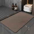 Diatomaceous earth bath mat